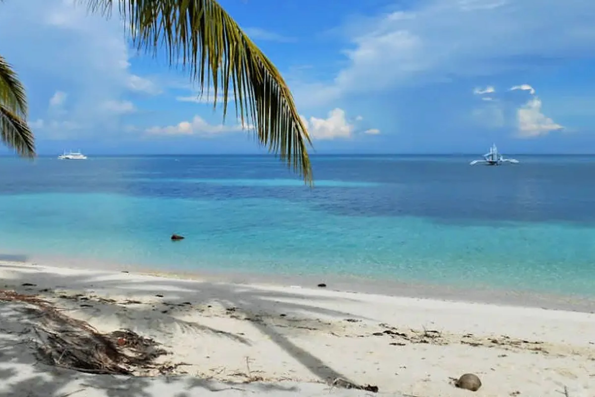 Kalanggaman & Malapascua Island Day Tour with Private Transportation